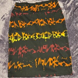 LuLaRoe Black Cassie Skirt with Red, Orange, and Yellow Accents